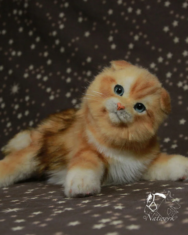 Реалистичный рыжий котенок