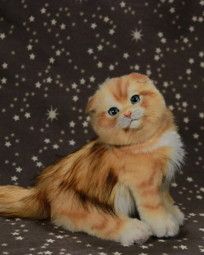 Реалистичный рыжий котенок