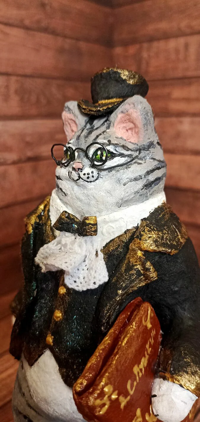 Кот учёный
