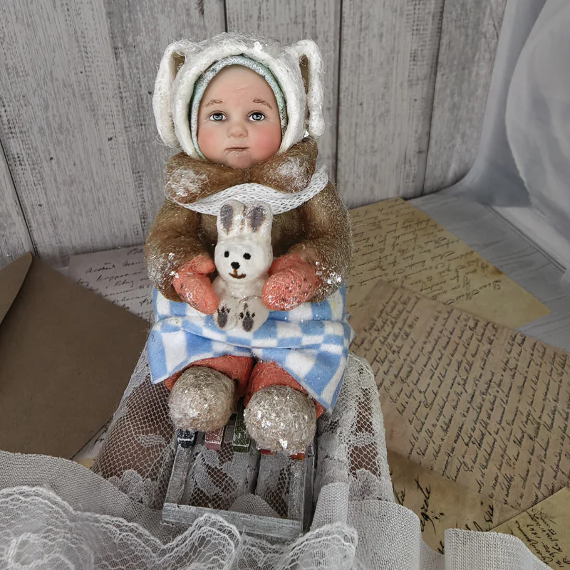 Ватная игрушка " Заинька на санках с игрушкой "
