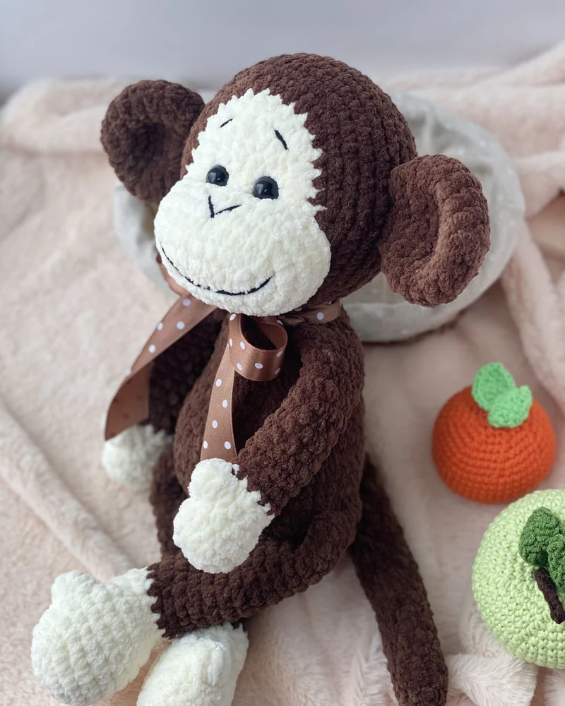 Вязаная коричневая обезьянка амигуруми