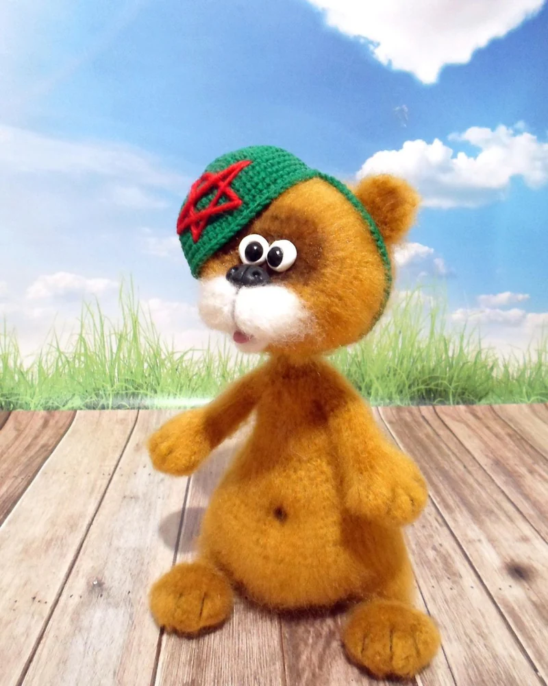 Вязаная игрушка мишка