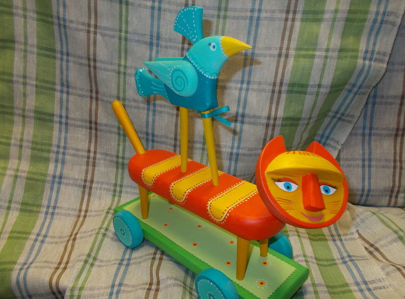 Рыжий кот и птичка