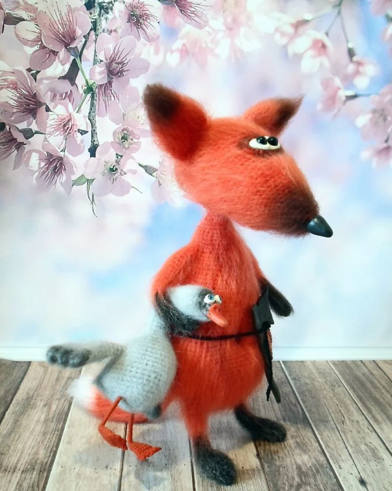 Лис с гусенком