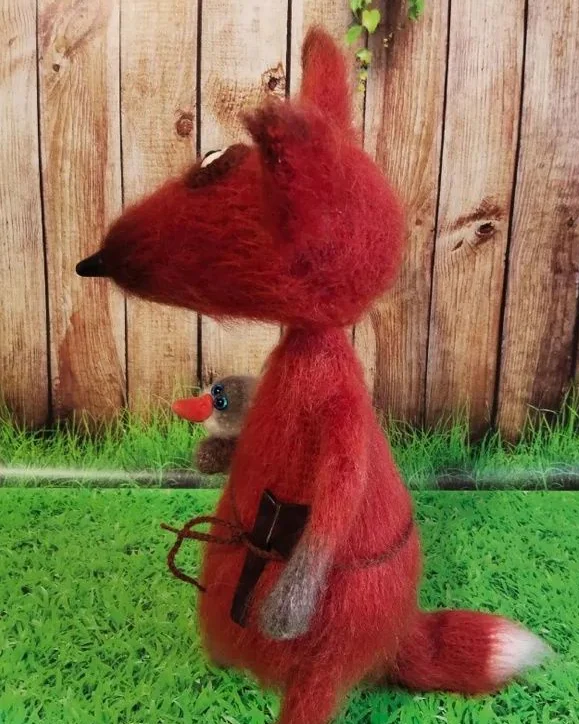 Лис с гусенком