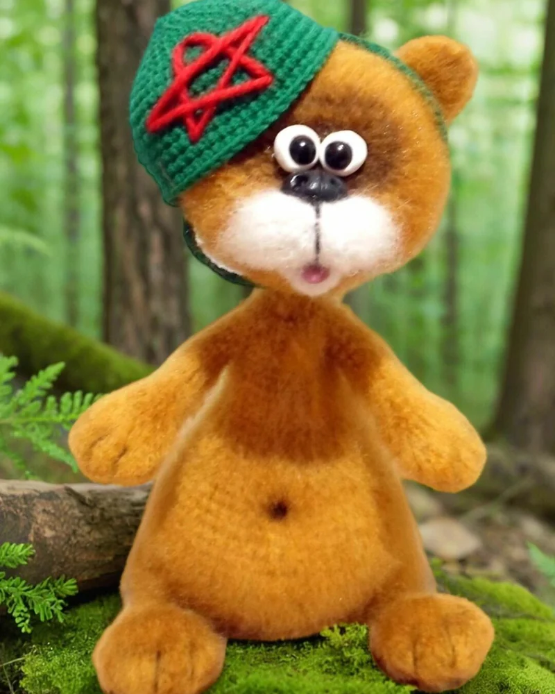 Вязаная игрушка мишка